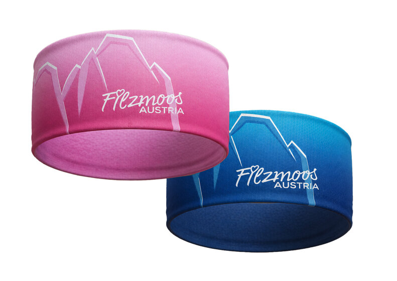 Zwei Filzmoos-Stirnbänder in Pink und Blau mit Bergmotiv und Austria-Schriftzug vor hellem Hintergrund. | © Bergbahnen Filzmoos GmbH
